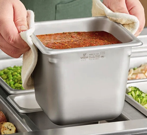 Sartén de acero inoxidable antiatasco Vigor de 1/6" de profundidad y calibre 22 para mesa de vapor o hotel